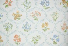 an old wallpaper with many different flowers on it