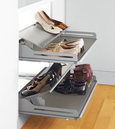 there are several pairs of shoes on the shelf