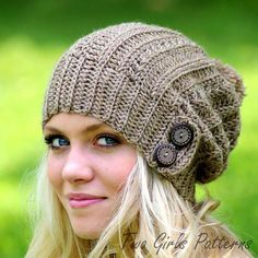 a woman with blonde hair wearing a knitted hat