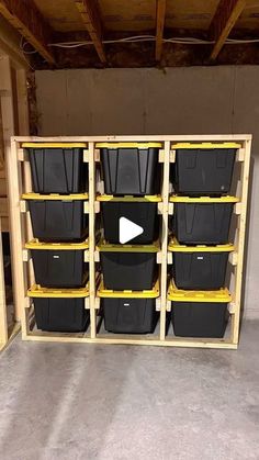 the storage room is filled with plastic bins