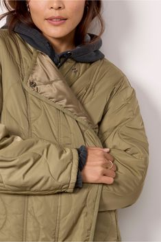 The Elva jacket by Pistola will be your favorite fall layer. Crafted in quilted nylon, this olive green jacket features a front zipper and snap closure, long sleeves, and a relaxed fit that's perfect for wearing over tees, sweaters, and hoodies. Olive Utility Outerwear For Winter, Olive Utility Winter Outerwear, Green Quilted Puffer Jacket For Fall, Khaki Quilted Long Sleeve Jacket For Cold Weather, Fall Green Quilted Puffer Jacket, Military Style Olive Outerwear For Cold Weather, Green Long Sleeve Quilted Jacket, Luxury Green Long Sleeve Quilted Jacket, Olive Military Outerwear For Cold Weather