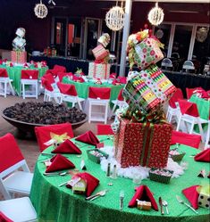 a green table topped with lots of presents