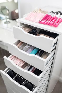 the drawers are full of cosmetics and make - up products