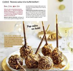 a magazine page with chocolate truffles on a plate and wine glasses in the background