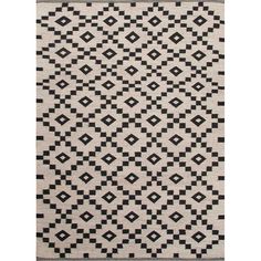 a black and white rug with squares on it