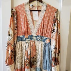 In Beautiful Vintage Condition! A Boho Patchwork Dress With A Lace Collar And Zipper Down The Back. Gorgeous And Eye Catching Pit To Pit: 17 1/2" Length: 55" Bohemian Long Sleeve Floral Patchwork Dress, Long Sleeve Dresses With Floral Patchwork For Spring, Spring Floral Patchwork Long Sleeve Dress, Spring V-neck Maxi Dress With Patchwork, Long Sleeve Mixed Print Dress For Spring, Spring Pink Patchwork Maxi Dress, Bohemian Midi Dress With Lace Patchwork For Spring, Pink Bohemian Dress With Lace Patchwork, Bohemian Midi Dress With Lace Patchwork