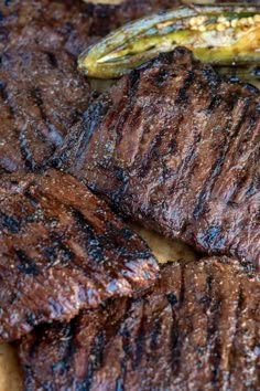 grilled steak and asparagus on a wooden cutting board