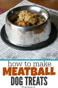 a metal bowl filled with meat on top of a newspaper next to a dog dish