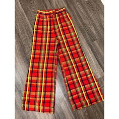 Vintage 1970s Red Orange Green & Yellow Plaid Tartan High Waisted Wide Leg Flare Pants Trousers No Material Tag Or Size But It Has A Cross Between Acrylic Cheesecloth/Hopsack/Linen Feel Size Xs ( I Believe If You Get The Sewing Undone Shown In Photo It Can Be Added An Extra Inch In The Waist) Measurements Laying Flat L-41.5 Waist-12 Hips-15.5 Inseam-29 Rise-14 Leg Hole-12 Wide Leg Flare Pants, Yellow Pants, Yellow Plaid, Vintage Pants, Pants Trousers, Vintage 1970s, Flare Pants, Green Yellow, Vintage 70s