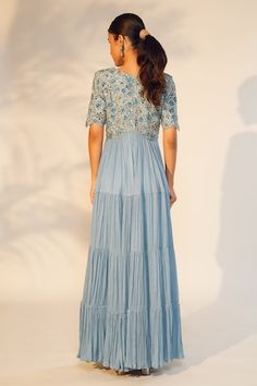 Powder blue denting and satin chinon tiered gown with resham and cutdana hand embroidered yoke. - Aza Fashions Festive Tiered Wedding Dress, Blue Tiered Maxi Dress For Wedding, Elegant Tiered Festive Dresses, Elegant Festive Tiered Dresses, Fitted Tiered Dress For Festive Occasions, Gowns Blue, Tiered Gown, Gown For Women, Powder Blue