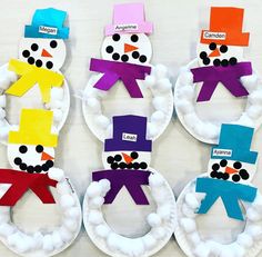 three snowmen made out of paper plates