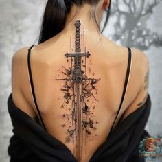 A beautiful sword tattoo featuring a detailed and delicate design, accented with floral and decorative elements. Ideal for women seeking an elegant and feminine tattoo on the back. Check out inktat2.com for more inspiring designs. Save this pin for future reference! Female Spine Tattoos, Bookish Tattoos, Tattoo Female, Detailed Tattoo, Spine Tattoo, Back Tattoo Women, Badass Tattoos, 1 Tattoo