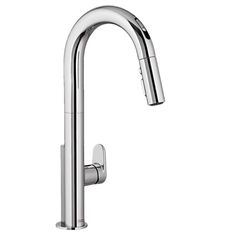 the kitchen faucet is chrome and has an angled spout, which can be used