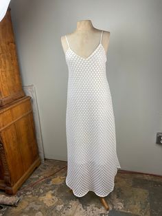 2023 New production slip dress. Made in French cotton lace from the 2000's.   The dress should fit like a glove, the lining is cut on the bias and this unique lace "gives".   The dress is appropriate for most all summer events.  It is size Medium size 6 - 8.   Must go to the dry cleaners. White Midi Length Slip Dress With Lace Trim, White Midi Slip Dress With Lace Trim, Summer Lace Slip Dress With Bias Cut, White Lace Dress With Bias Cut, White Lace Dresses With Bias Cut, Spring Midi-length Lace Slip Dress, Spring Lace Slip Dress In Midi Length, Spring Lace Midi Slip Dress, White Lace Bias-cut Slip Dress