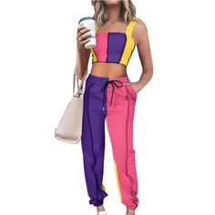 Purple Colorblock Crop Tank with Pant Set Trendy Multicolor Color Block Pants, Multicolor Cotton Sets With Color Block, Multicolor Cotton Color Block Sets, Fitted Multicolor Color Block Pants, Multicolor Color Block Sets For Summer, Fitted Casual Color Block Pants, Casual Multicolor Patchwork Sets, Spring Multicolor Color Block Sets, Casual Pink Patchwork Sets