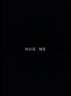 the words hug me are lit up in the dark