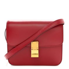 This is an authentic CELINE Box Calfskin Teen Classic Box Flap Bag in Red. This chic shoulder bag is crafted of luxuriously smooth deep red box calfskin leather. The bag features a waist-length shoulder strap and a facing flap with a gold switch-lock. The flap opens to a partitioned leather interior with a patch pocket. Celine Box Bag, Celine Box, Vanity Case, Black Cross Body Bag, Waist Length, Flap Bag, Leather Interior, Pink Bag, Deep Red