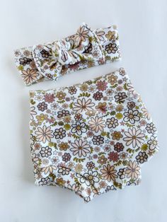 two pieces of cloth with flowers on them