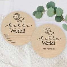 two personalized wooden coasters with animals on them