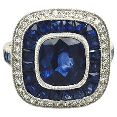 Art deco style ring set in platinum features a 3.11 carat blue sapphire center. Encompassing it are sapphires weighing a total weight of 1.71 carats and round diamonds weighing 0.35 carats. Sophia D by Joseph Dardashti LTD has been known worldwide for 35 years and are inspired by classic Art Deco design that merges with modern manufacturing techniques. Ring Art Deco, Estilo Art Deco, Platinum Ring, Art Deco Design, Art Deco Style, Deco Style, Cocktail Rings, Classic Art, Art Deco Fashion