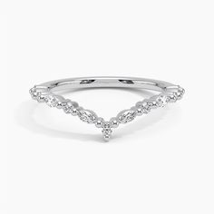 a white gold ring with diamonds on it