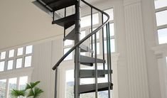 there is a metal spiral staircase in the house