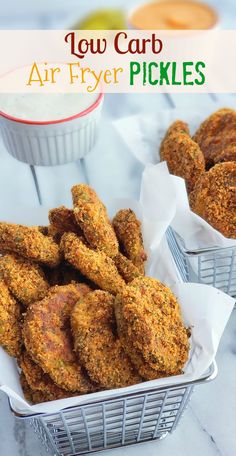 fried air fryer pickles in baskets with dipping sauce on the side and text overlay that reads low carb air fryer pickles