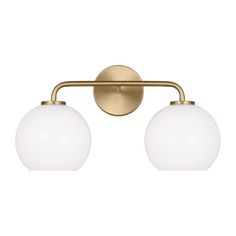 A smooth blend of mid-century + industrial elements, this vanity light’s two glass globe shades hang from steel hardware. It’s dimmable and suitable for damp locations, so it can brighten a bathroom. Add filament bulbs to play up the vintage-inspired vibe. AllModern Finish: Satin Brass, Shade Color: White AllModern Childerley 2 Light Vanity in Satin Brass/White | Size 10.13" H X 17.5" W X 8.75" D Industrial Farmhouse Lighting, Delta Champagne Bronze, Gold Light Fixture, Vintage Industrial Design, Wall Vanity, Transitional Lighting, Transitional Vanity, Brass Bathroom, 5 Light Chandelier