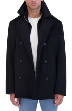 Adjust your look as the temperatures dip in this timeless peacoat jacket styled with a removable bib and multiple pockets. 32" length Double-breasted button closure Notched collar Front welt pockets Back vent Lined 60% other fibers, 40% wool Dry clean Imported Winter Long Pea Coat With Snap Buttons, Double-breasted Peacoat With Double Button Closure, Winter Pea Coat With Double-breasted Button Fastening, Winter Double-breasted Pea Coat With Hidden Buttons, Winter Double-breasted Pea Coat With Button Closure, Double-breasted Winter Pea Coat With Button Closure, Long-sleeved Peacoat With Double Button Closure, Collared Winter Pea Coat For Workwear, Collared Pea Coat For Winter Workwear