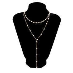 Description:Dainty Layered Natural Crystal Y Necklace SetSpecifications:Material: alloy metal. copper. natural crystalColor: white/blackSize: 11.8" - 15.7"Weight: 0.33 oz/setFeatures & Details:Material: this dainty crystal Y necklace set is friendly to skins. It won't be fading and rusting.Size: you can easily adjust the length of the necklace according to yourself. the lobster clasp can be opened and closed easily.Stylish design: the simplistic and delicate crystal Y necklace set can match with any clothes especially V-neck tops.Nice gifts: this crystal necklace set is a good choice to share with your mother. sister. friends. classmate. lover for birthday. anniversary. holidays. graduation. christmas. valentine's day or birthday etc.Any type of art can be kept alive only when it can breat White Beaded Necklace With Adjustable Chain, White Alloy Necklaces For Party, White Metal Choker With Clavicle Chain, White Pearl Necklace With Alloy, White Alloy Necklace For Party, White Alloy Chain Necklace For Party, Adjustable White Metal Beaded Necklace, White Pearl Necklace With Delicate Metal Chain, Adjustable White Clavicle Chain Necklace