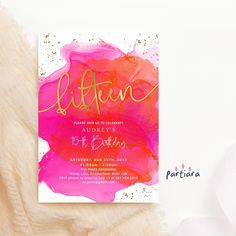 a pink and gold baby shower with the word girl on it's back in gold foil