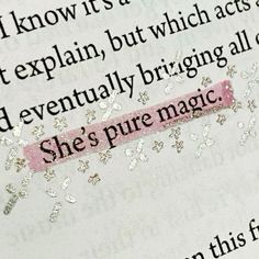 an open book with the word she's pure magic written on it and sparkles