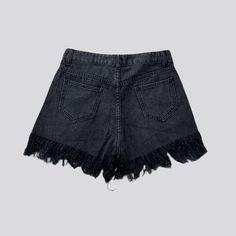 Unlock the perfect combination of retro glamour and modern chic with our Y2K-flair tassel hem rhinestone denim shorts from the 2023 Summer Collection. Flaunting a medium-waist. straight silhouette. these shorts are embellished with a zipper and button closure. exuding a contemporary allure silhouette for any occasion.Why You'll Love These ShortsAchieve a timelessly stylish look with this exquisite piece. From low-key backyard gatherings to summer soirees. let these shorts be your go-to for an ef Trendy Summer Jeans With Fringe, Trendy Fringed Summer Jeans, Trendy Fringe Jeans For Summer, Summer High Waist Jeans With Fringe, Trendy High Rise Bottoms With Fringe, Trendy High Rise Fringe Shorts, High Waist Denim Jean Shorts With Fringe, High-waist Denim Jean Shorts With Fringe, Casual Jean Shorts With Rhinestone Fringe For Summer