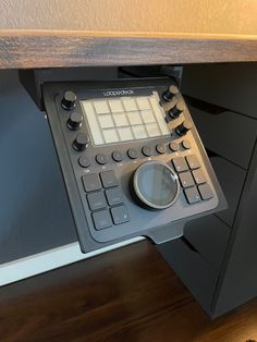 an electronic device is sitting on top of a desk