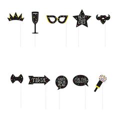 party photo booth props with black and gold foiled letters, crowns, glasses, and confetti sticks