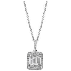 Showcasing baguette diamonds connected to look like a single large emerald cut diamond. Center diamond is surrounded by a diamond halo on an accented bale. Diamonds weigh 0.84 carats total. Suspended on an 18 karat white gold chain. Roman Malakov is a custom house, specializing in creating anything you can imagine. If you would like to receive a special quote on a custom piece please message or call us. Formal Emerald Cut Diamond Necklace With Diamond Accents, Emerald Cut Diamond Necklace With Accents For Formal Events, Formal Emerald Cut Diamond Necklace With Accents, Rectangular Pendant With Baguette Diamonds, Formal Emerald Cut Diamond Necklace, Emerald Cut Diamond White Diamond Necklace, Emerald Cut Diamond Necklace In Diamond White, Emerald Cut Diamond Necklace With Diamond Accents, Formal Jewelry With Baguette Diamonds And Rectangular Pendant