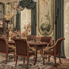 a large dining room with fancy furniture and chandelier