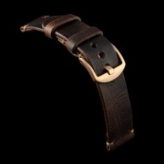 "This watch strap is of superior quality. It's made of premium Italian veg tanned leather from one of the best tanneries in Italy, which features a gorgeous camouflage pattern with natural characteristics that will give your watch an instant rugged and vintage stylish look. Its appearance will improve with time as it develops patina, wrinkles and marks. The color of Military 103 is a combination of different shades of dark brown with reddish hue creating a beautiful subtle camouflage pattern you Vintage Brown Leather Watch Accessories For Everyday Use, Classic Brown Watch With Waxed Finish, Classic Leather Strap Bracelet For Everyday Use, Classic Leather Bracelet For Everyday, Everyday Vintage Brown Leather Watch Band, Classic Brown Vegetable Tanned Leather Watch Band, Everyday Gold Leather Watch Band, Everyday Brown Watch With Waxed Finish, Vintage Brown Leather Watch Bands With Waxed Finish