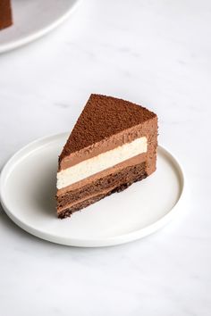 a piece of cake sitting on top of a white plate