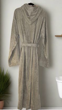 Luxuriously 100% Cotton makes this long maxi length robe the ultimate in comfort with a spa like feel. Button detail will allow you to effortlessly keep those sleeves rolled up comfortably and without fuss. DETAILS & CARE 60" length 28" sleeve Length Front patch pockets Removable sash 100% Cotton Machine wash, tumble dry Imported Size Chart SIZE (in) LENGTH CHEST SLEEVEM/L 60in 50in 28inXL/1XL 60in 55in 28in2XL/3XL 60in 63in 28in