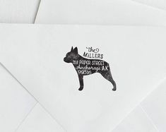 an envelope with a dog stamp on the front and back of it's envelope