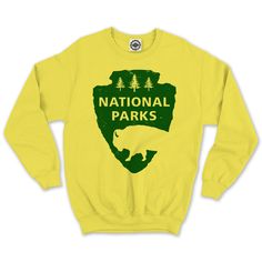 Take a hike in this crew neck, fleece sweatshirt featuring our own take on the National Parks Service logo. Hank Player is proudly designed and crafted in Los Angeles, California with the finest quality materials. Our super-soft fleece will have a weathered, worn-in feel after the first wash. Slight variations in color and print create Hank Player’s one-of-a-kind look. This item is a unisex style, please order one size smaller for a women’s fit. Fleece Fan Apparel Sweatshirt With Logo Print, Fan Apparel Fleece Sweatshirt With Logo Print, Logo Print Fleece Sweatshirt For Fans, Fleece Sweatshirt With Logo For Fans, Fleece Crew Sweatshirt Fan Apparel, Crew Neck Hoodie With Letter Print For Outdoor Activities, Letter Print Crew Neck Hoodie For Outdoor Activities, Crew Neck Cotton Hoodie For Hiking, Fleece Hoodie For Outdoor Activities With Crew Neck