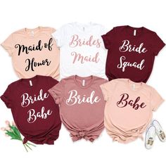 four bridesmaid shirts in different colors and styles with the words bridal maid on them