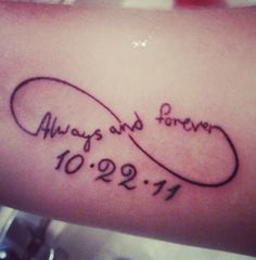 a tattoo with the words always and forever written in cursive writing on it