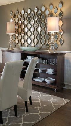 a dining room table with chairs and a mirror on the wall above it that says interior idea 15 - framed mirrors for modern rooms