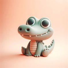 a small toy alligator sitting on top of a pink surface with eyes wide open and smiling