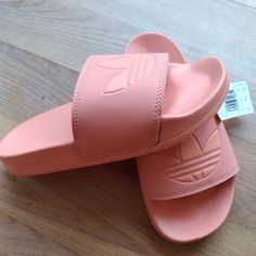 Women's Size 6.5 Or 7 In Women's Pink Flat Slides With Rubber Sole, Pink Slip-on Slides With Rubber Sole, Casual Pink Sandals With Round Toe, Casual Pink Slide Sandals, Trendy Pink Sandals With Rubber Sole, Trendy Pink Round Toe Slides, Casual Orange Slides For Spring, Adidas Slides With Cushioned Footbed For Spring, Pink Slides With Cushioned Footbed And Round Toe