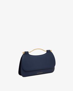 Strathberry - Harmony - Navy | Strathberry Modern Evening Bag With Handle Drop For Formal Occasions, Modern Top Handle Clutch For Evening, Modern Evening Clutch With Top Handle, Elegant Top Handle Clutch For Office, Modern Evening Bag With Round Handle For Formal Events, Modern Formal Evening Bag With Round Handle, Modern Clutch With Handle Drop For Formal Occasions, Modern Evening Clutch With Detachable Strap, Modern Clutch With Detachable Handle For Formal Events