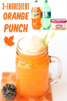 an orange punch in a mason jar with pine cones on the side and three ingredients to make it