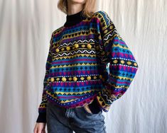 Cozy vintage sweater in bright dark colorful fair isle knit with heart and added 3D bubbles. Drop shoulders, hip length, 1x1 rib hem, cuffs and mockneck.  Fits like size M or smaller for even more oversized look. Our model is 5'6'' (170cm) tall and typically wears a size XS/S.  ✏️ TAGS MEXX WOMAN Size M 70% acrylic 30% wool Made in Hong Kong ✂️ CONDITION  Good vintage condition WASHED & STEAMED, ready to wear. 📏 MEASUREMENTS  Measured flat, please double for circumference and compare with a sim 3d Bubbles, Sweater Colorful, Vintage Pullover, Oversized Look, Fall Clothing, Fair Isle Knitting, Pullover Sweater Women, Wool Blend Sweater, Knit Jumper